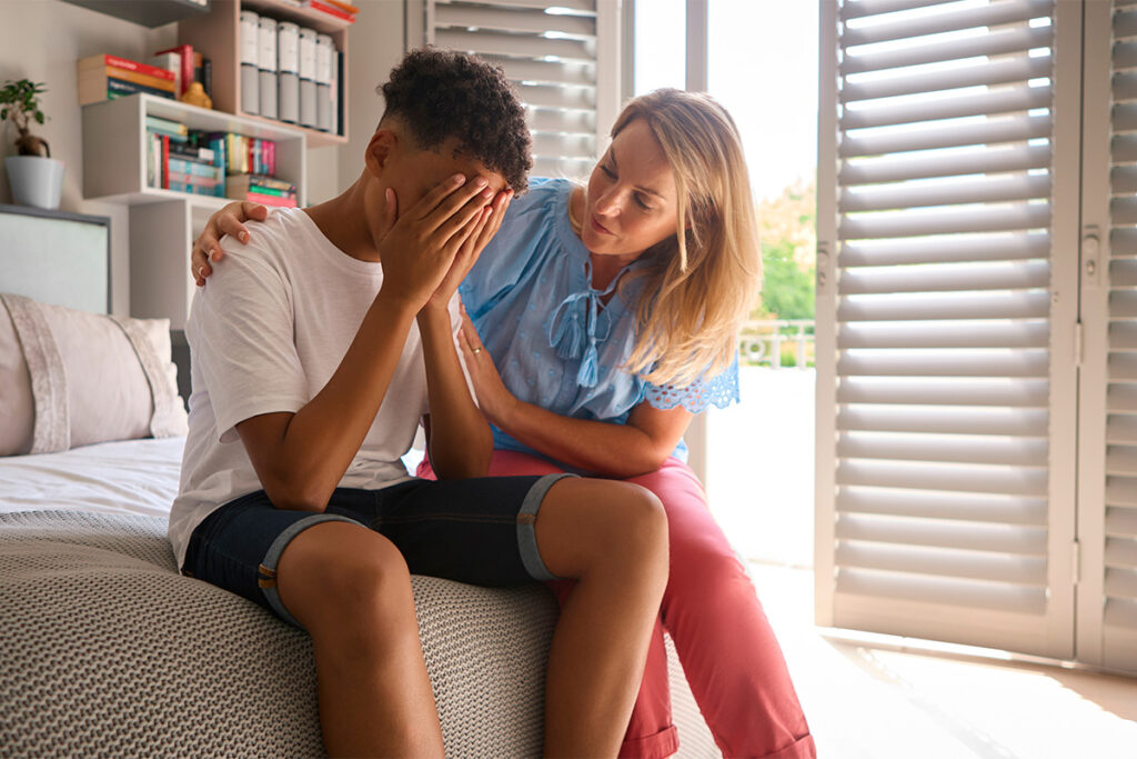 mother comforting teen after learning how does self-harm affect relationships